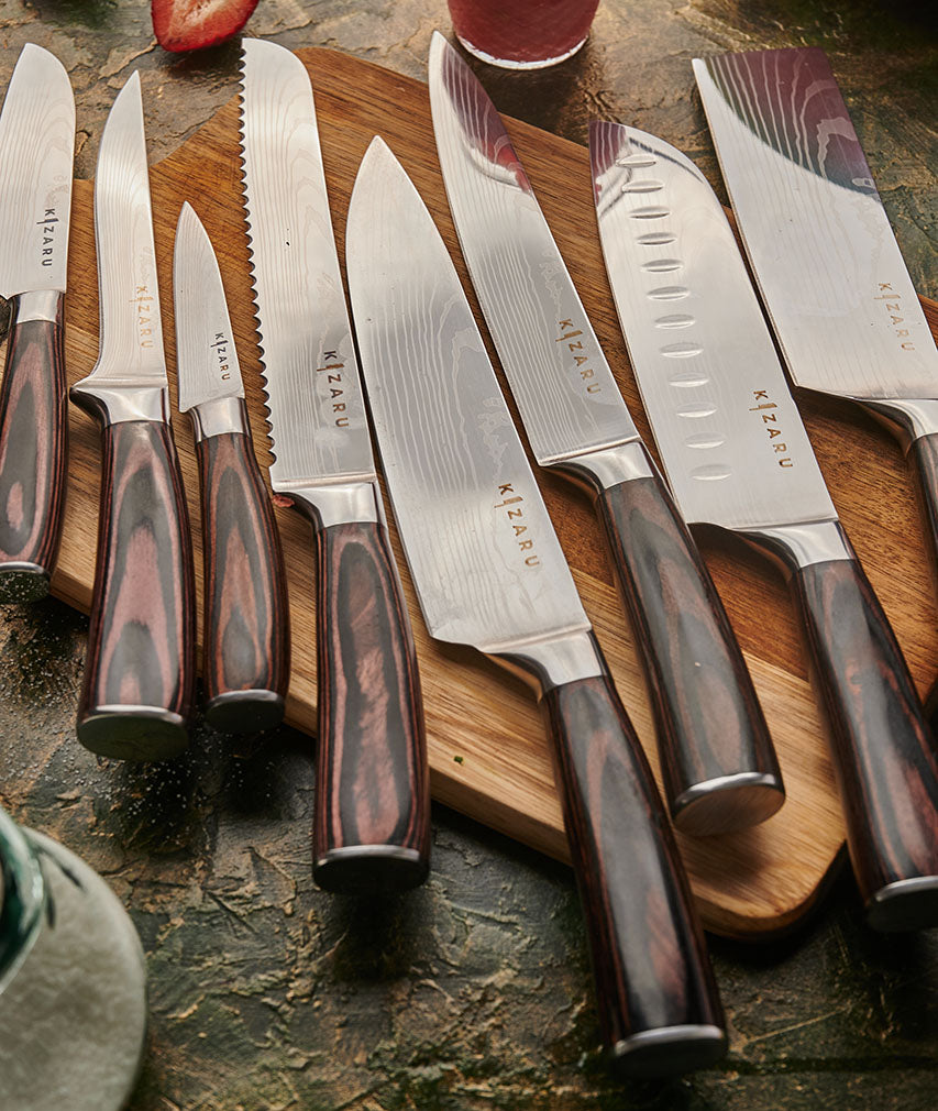 https://kizaruknives.com/cdn/shop/files/six-kitchen-knives-on-board.jpg?v=1688491508&width=853